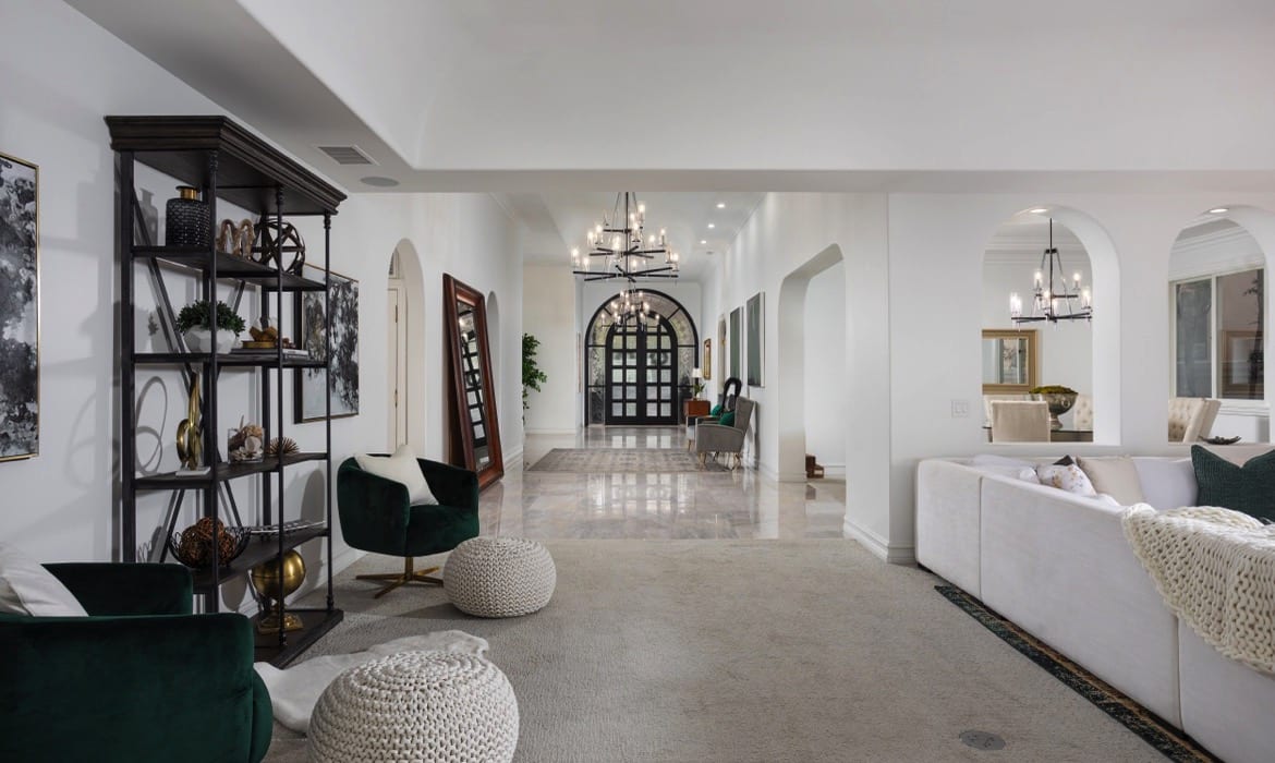 Brad-Feldman-Group-Top-Dana-Point-Real-Estate-44-Ritz-Cove-Dr-Web-10-proper-foyer-separates-an-enormous-living-room-and-dining-area