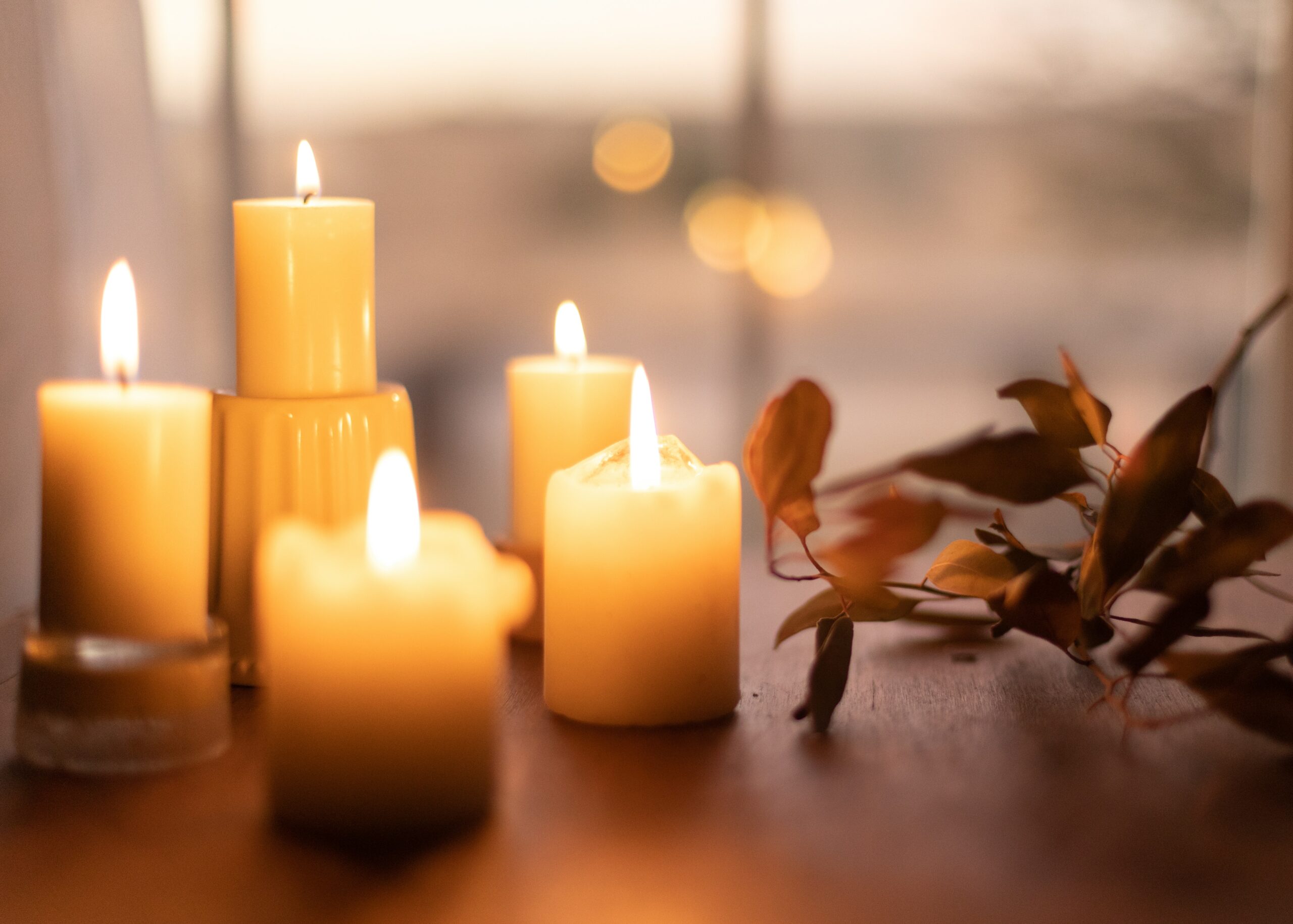 A table with white candles