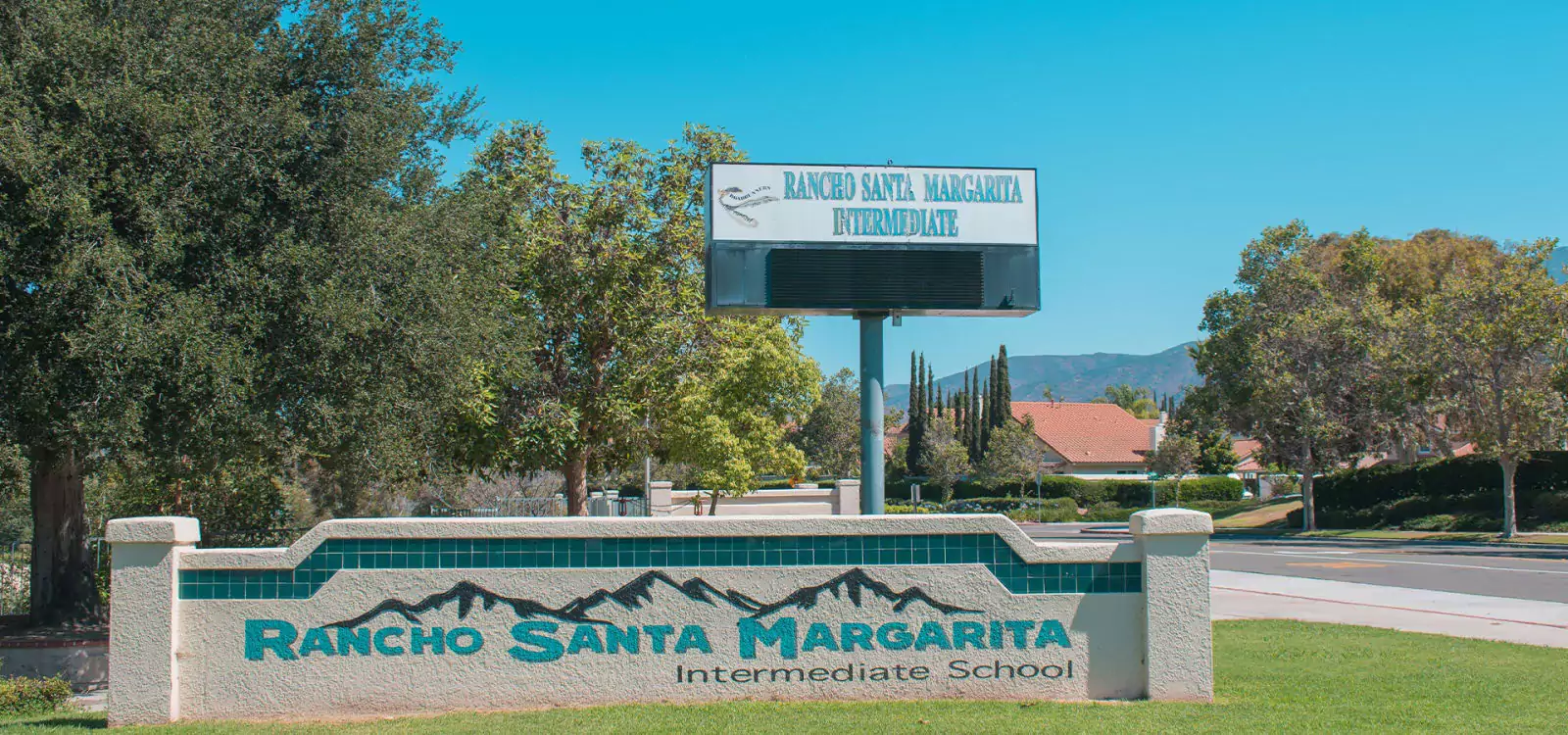 View of Entrance Signs in Teal and Dark Teal Coloring for Rancho Santa Margarita Intermediate School