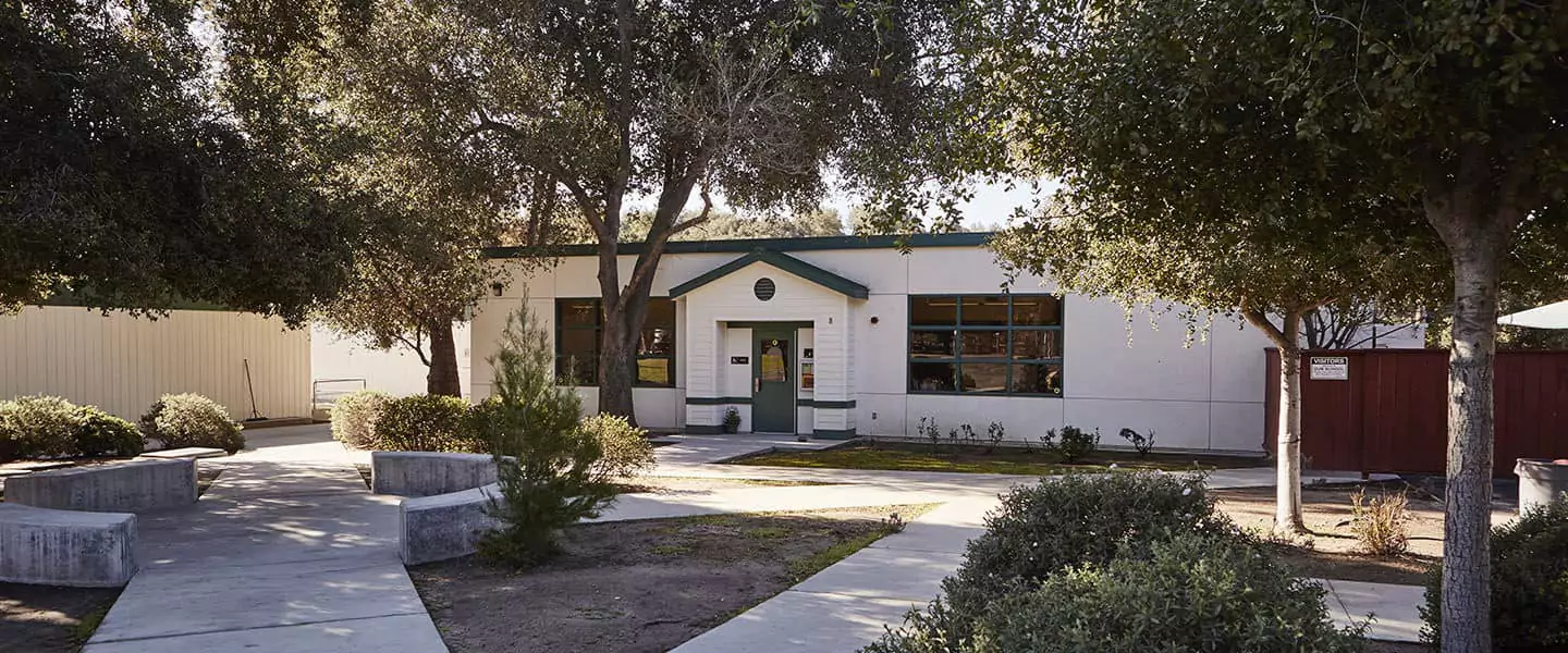 Outdoor View of White and Green Building that is Trabuco Elementary School