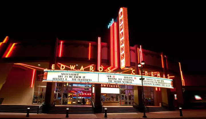 nighttime view of edwards cinemas movie theater in downtown brea