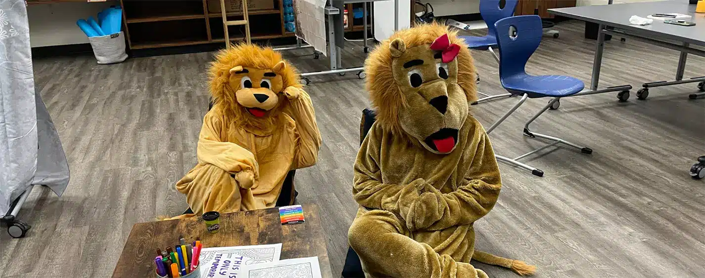 Two Students Dressed Up as the Lions Mascot at Lexington Junior High School