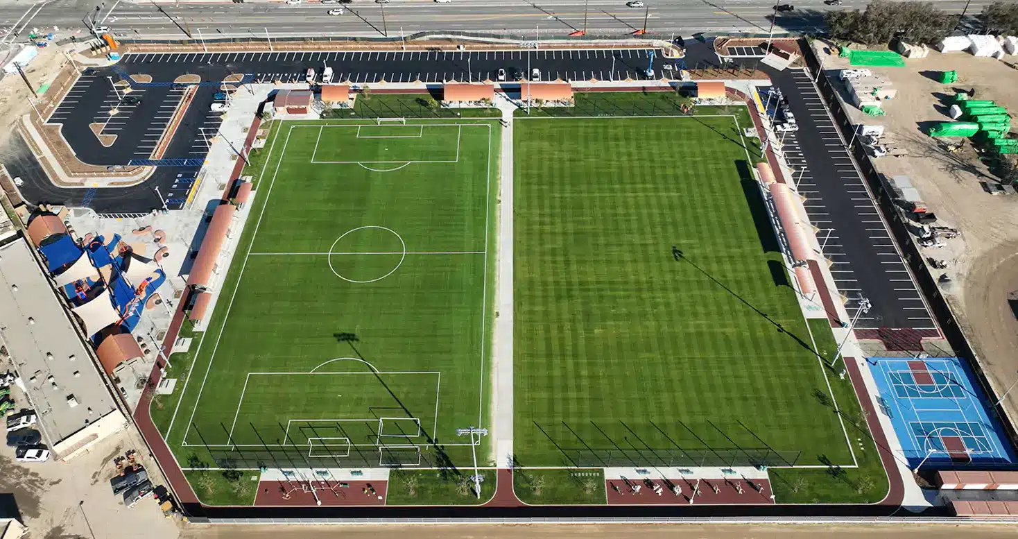 Aerial View of Pristine Soccer Field, Football Field, Basketball Court, and Playground Area at Lexington Park