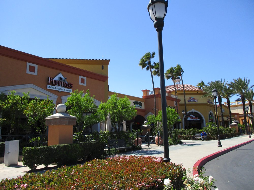 Exterior View from Sidewalk of Foothill Ranch Town Centre including Restaurant and Boutique retail stores