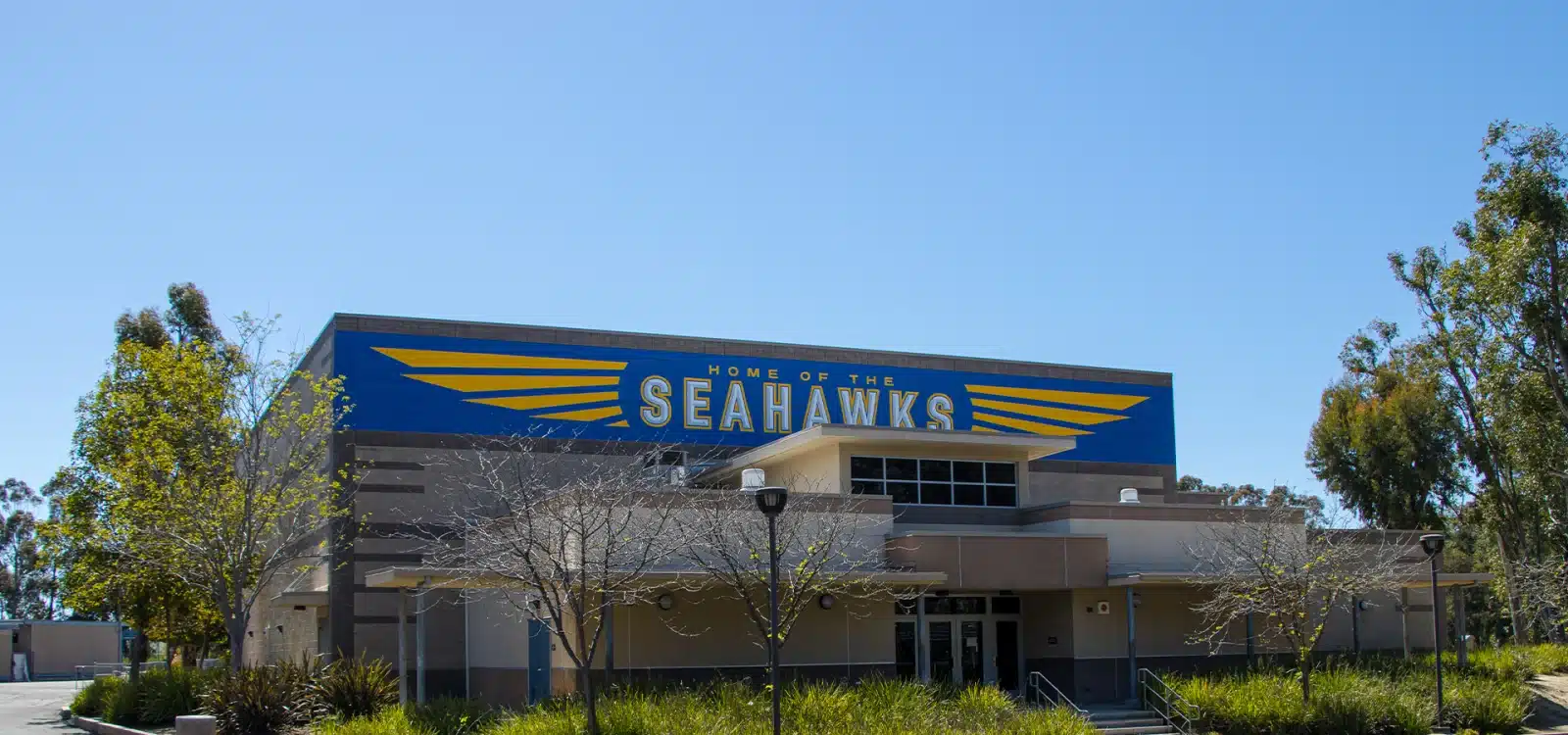 Exterior View of Building that reads Home of the Seahawks that is Serrano Intermediate School