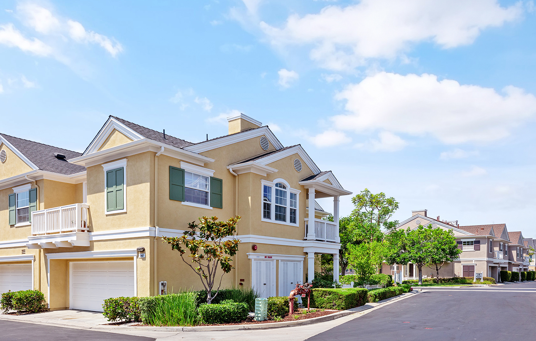 Exterior view of a Ladera Ranch townhome on a sunny day