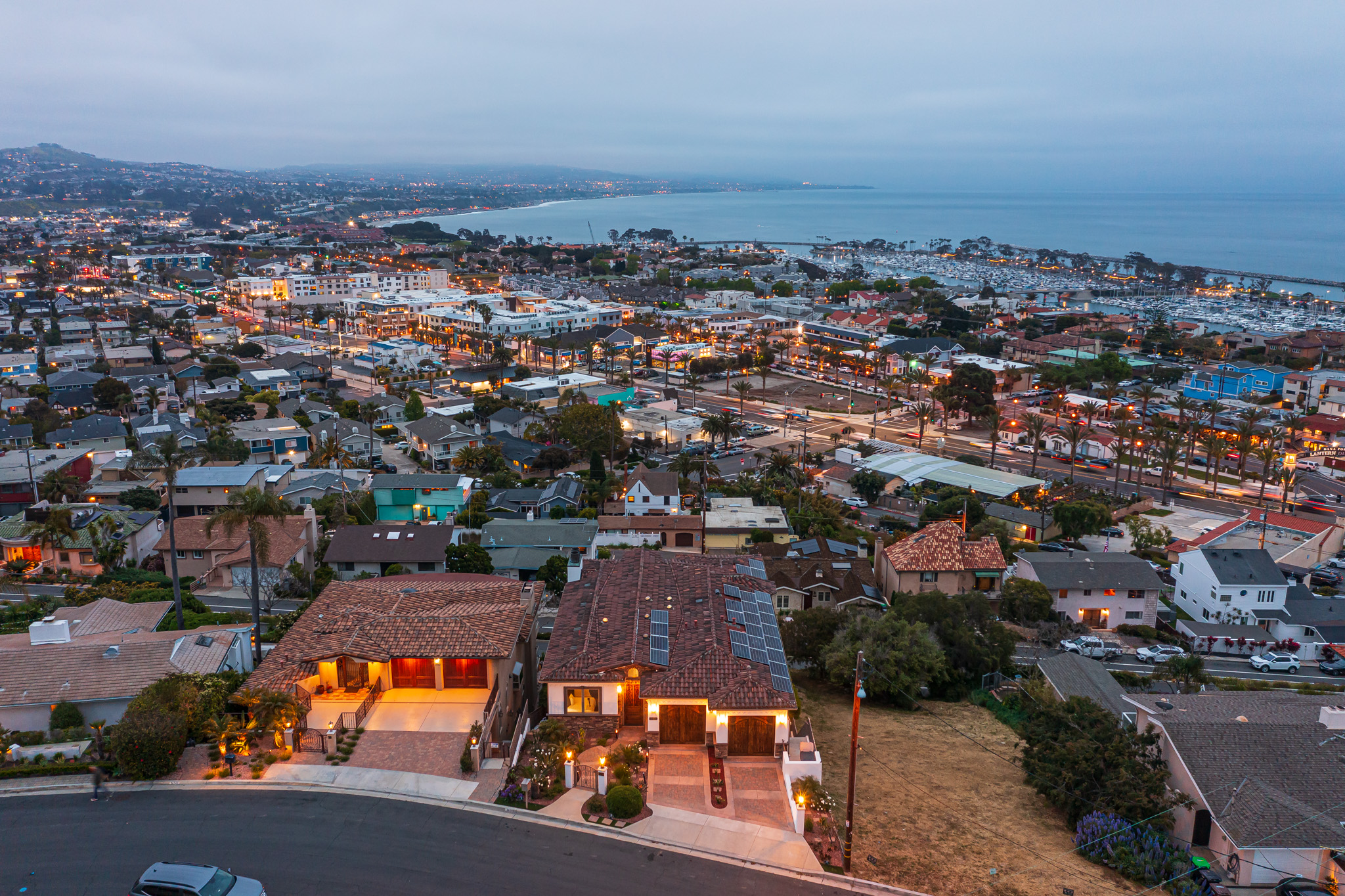 Aerial view of Dana Point harbor and surrounding luxury homes