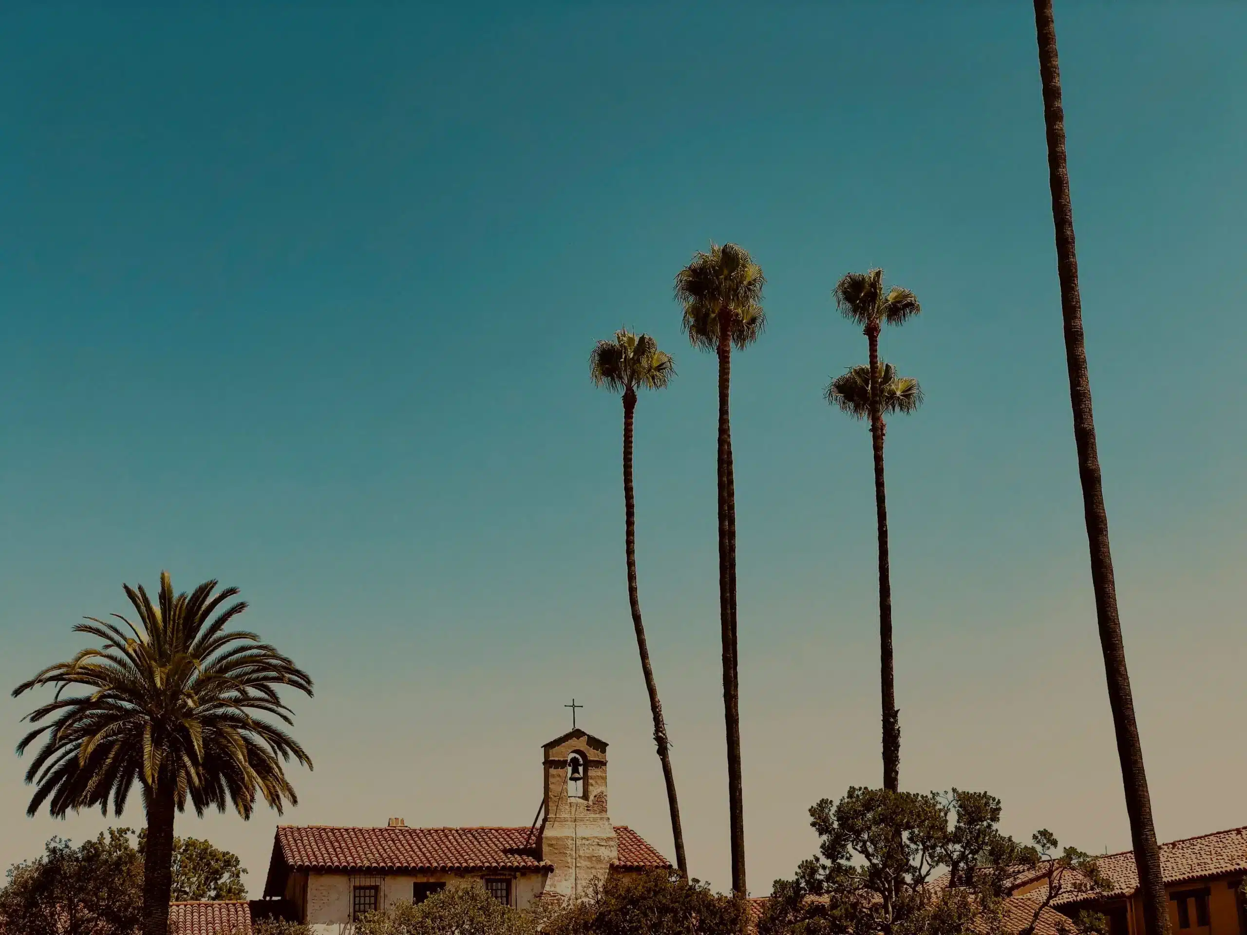 Mission San Juan Capistrano at dusk, a historic landmark in San Juan Capistrano, CA