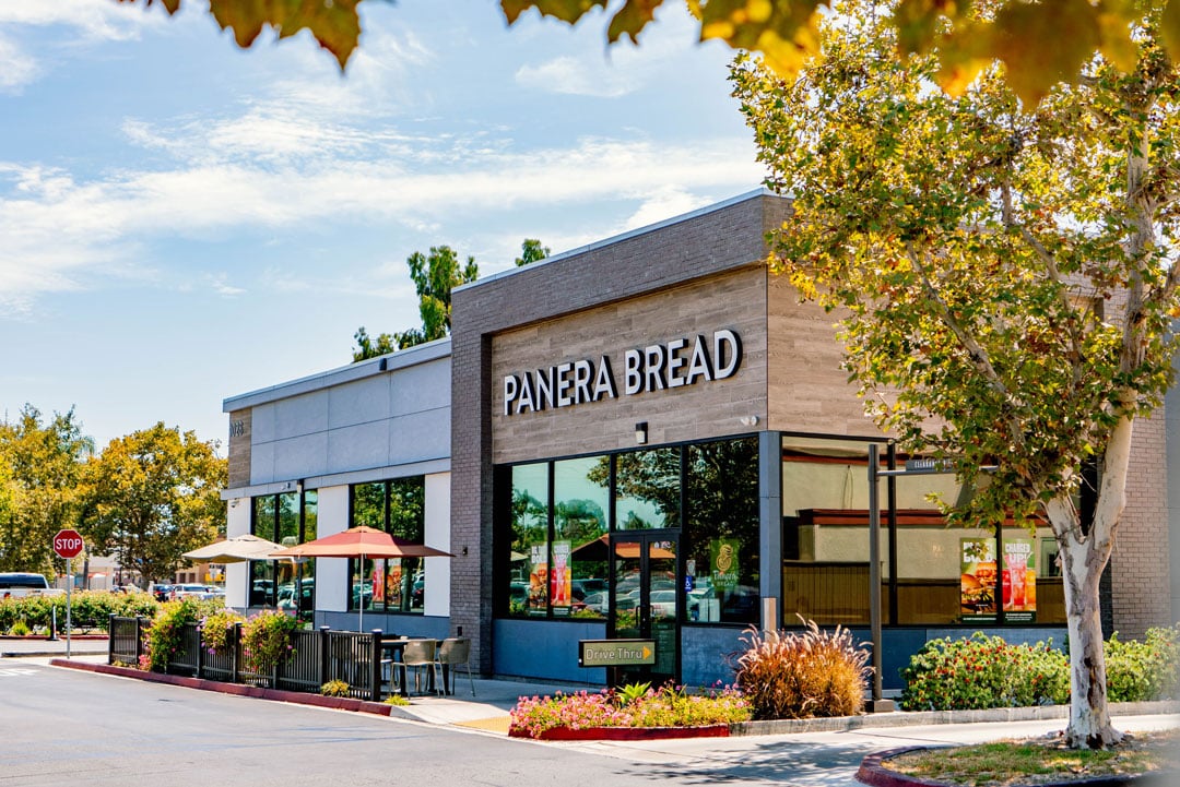 Exterior view of newer modern Panera Bread stand alone storefront located at Fullerton Town Center