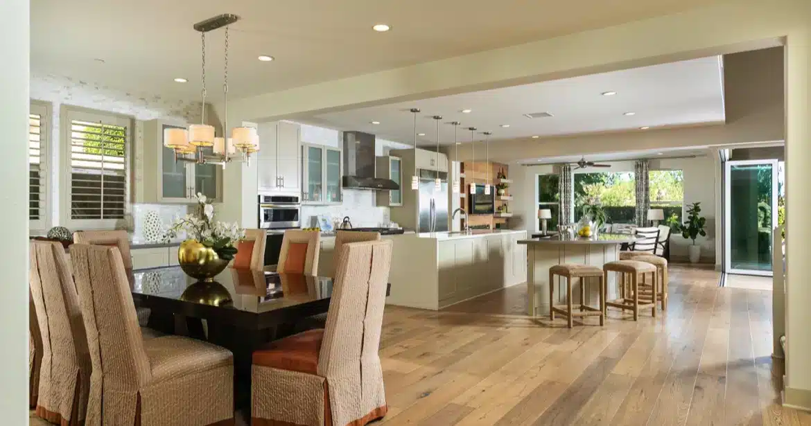 Spacious open-concept kitchen and dining area in a luxury Aliso Viejo home, featuring contemporary design perfect for fall entertaining and family gatherings.