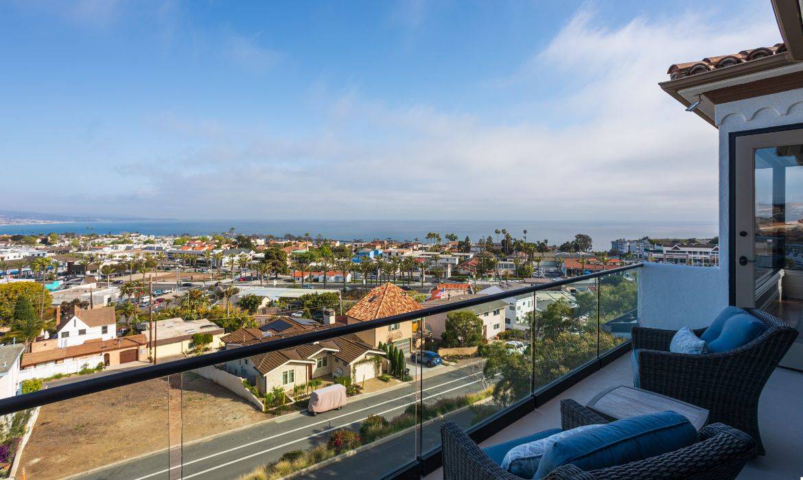 Balcony in luxury home overlooking the ocean and Lantern District, sold by top Laguna Niguel vs Dana Point realtors Brad Feldman Group