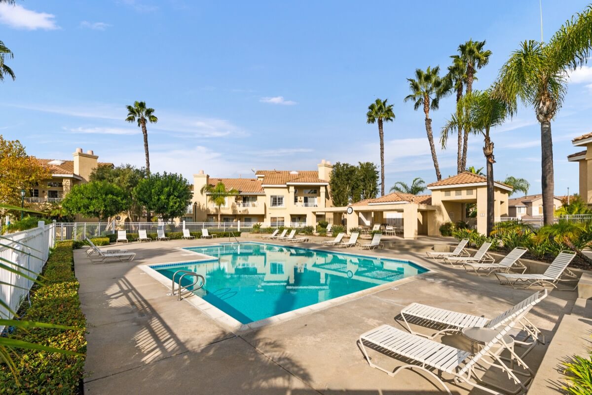 Community pool in Laguna Niguel condo development, showcasing the amenities and housing real estate options compared to Dana Point