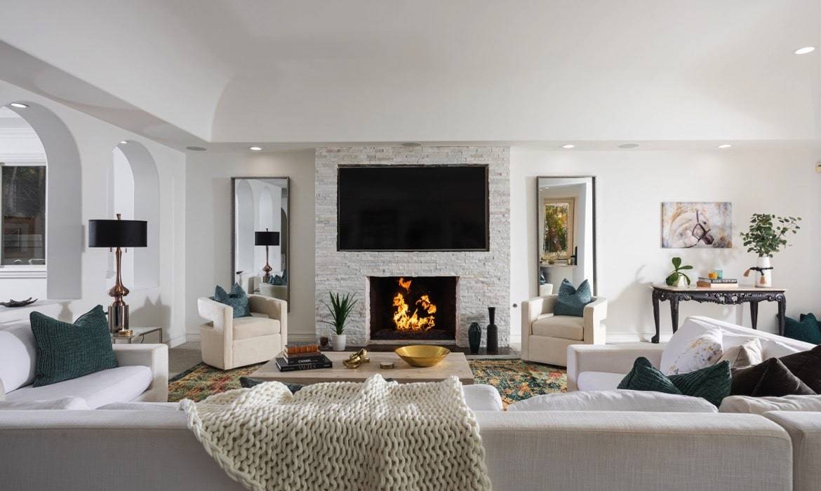 Luxury living room with a fireplace in Dana Point sold after staging and updates for the best possible price