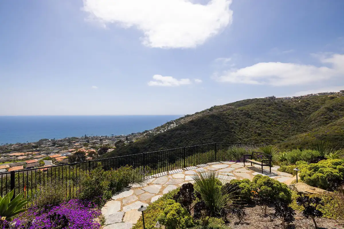 Backyard patio with ocean views at a luxury real estate listing sold by top listing agents in Orange County, Brad Feldman Group