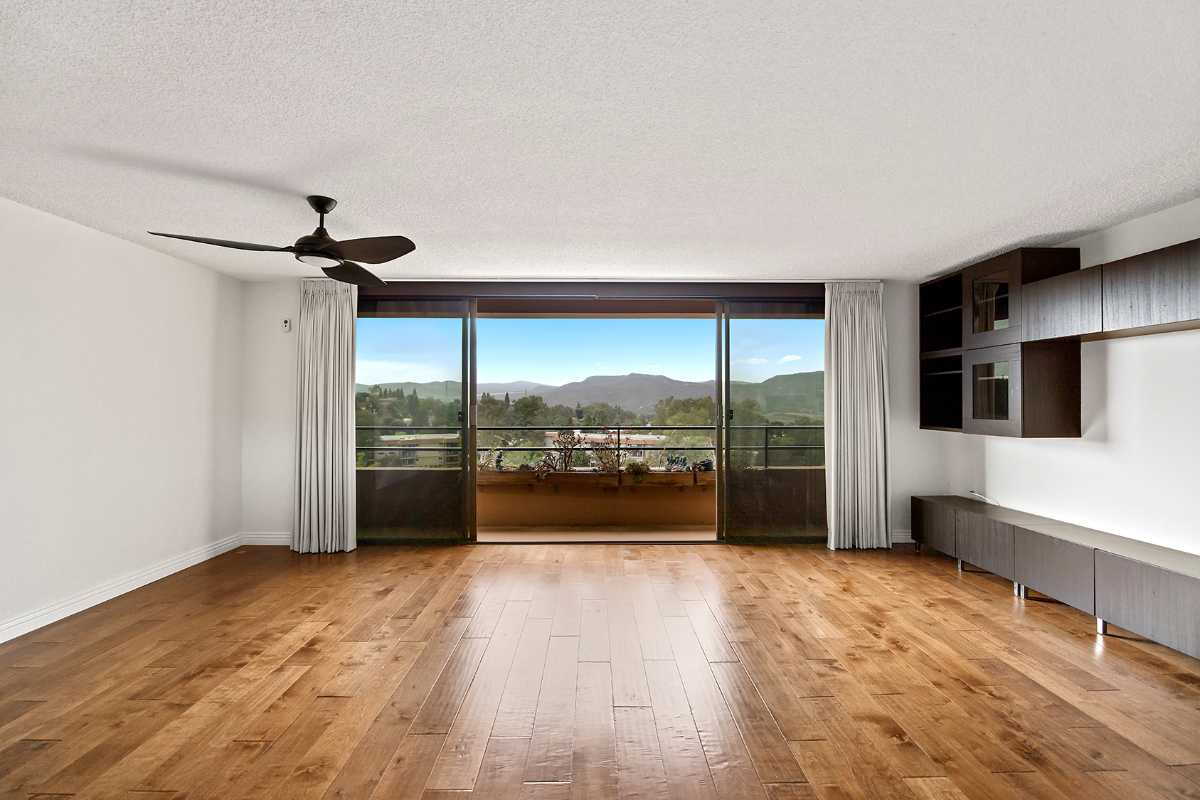 Empty living room of a Laguna Woods home for sale by top Orange County realtor agents Brad Feldman Group