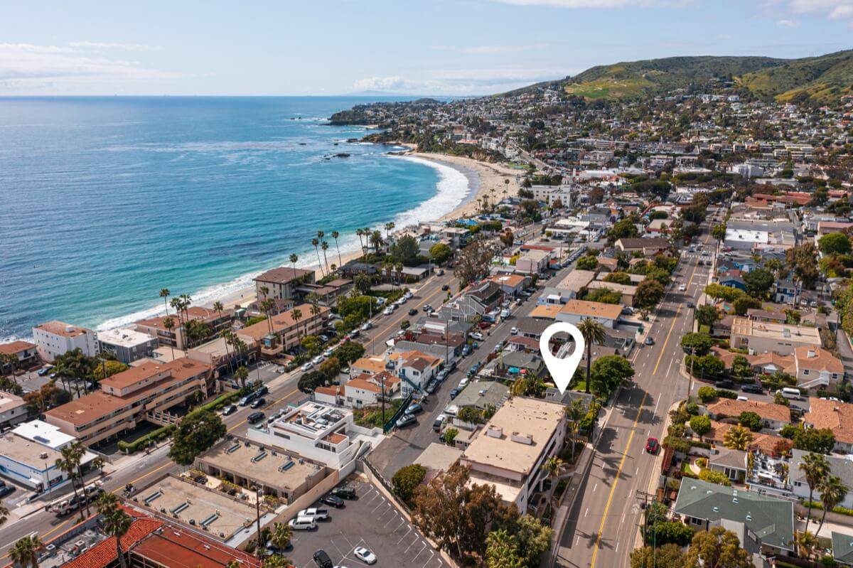 Drone photo of a Laguna Beach home two blocks from the ocean sand and waves, sold by the best listing agent in Orange County, Brad Feldman Group