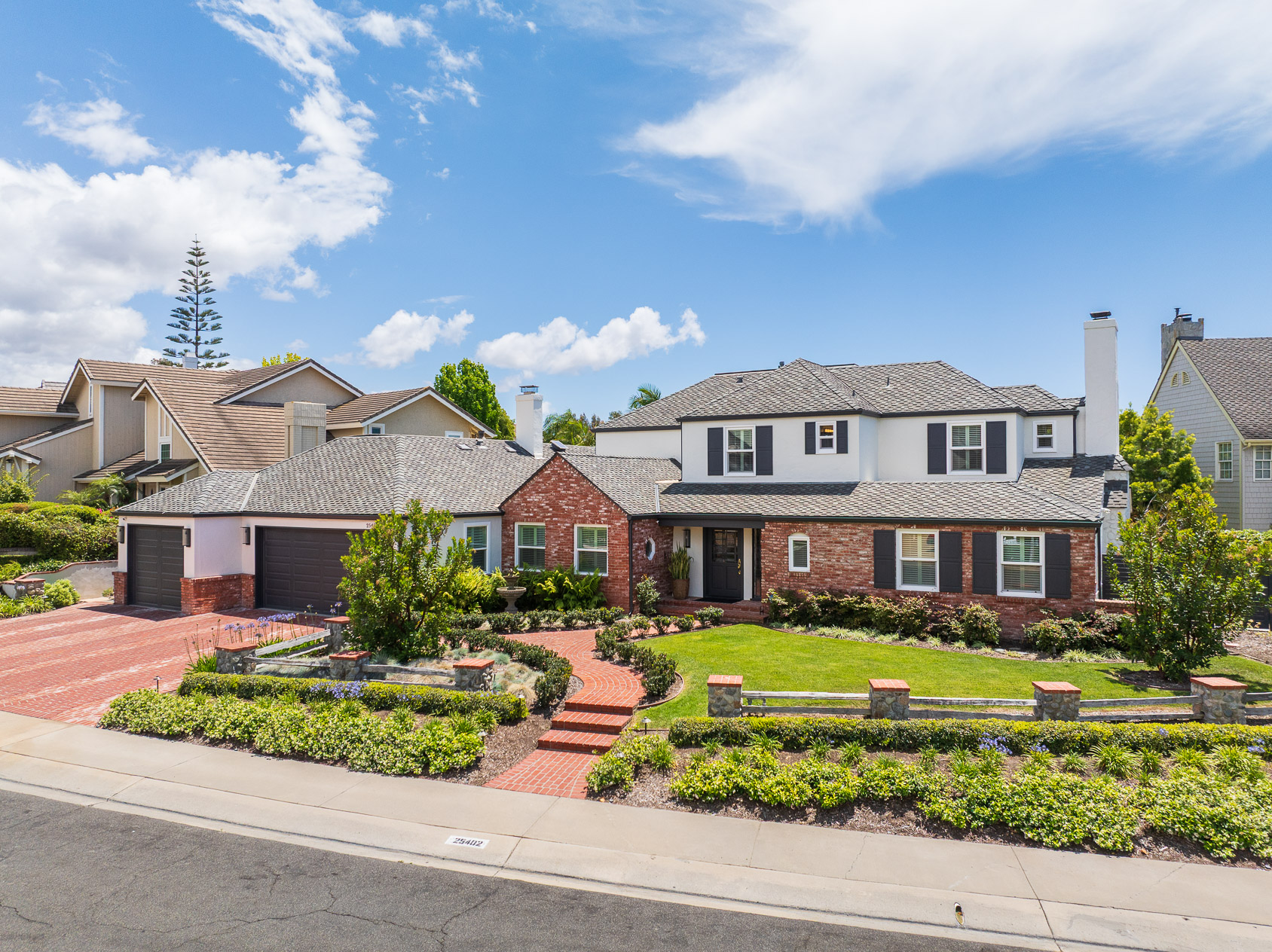 Front exterior of a luxury home in Nellie Gail Ranch showcasing the best preparations that top local realtor agents recommend before you sell